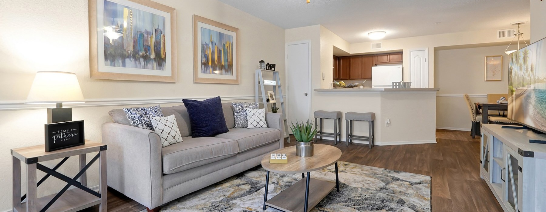 a living room with a couch and a table