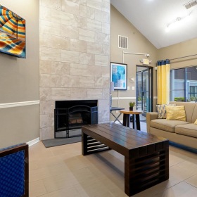 a living room with a fireplace
